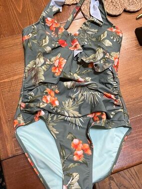 Floral Ruffle One-Piece Swimsuit in Olive Green with Coral Blooms
